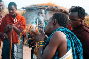 Masai warriors dancing traditional jumps as cultural ceremony, review of daily life of local people on March 9, 2020. Tanzania.