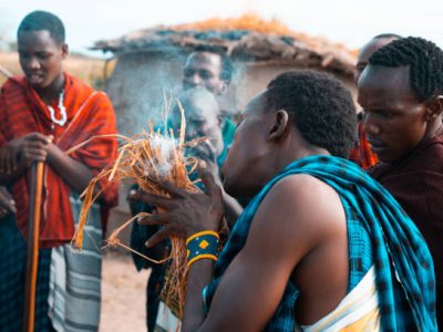 Masai warriors dancing traditional jumps as cultural ceremony, review of daily life of local people on March 9, 2020. Tanzania.
