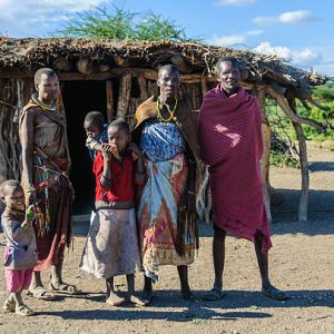 Lake Eyasi, Tanzania - May 29, 2015: A Datoga family in front of their home at Lake Eyasi, Tanzania